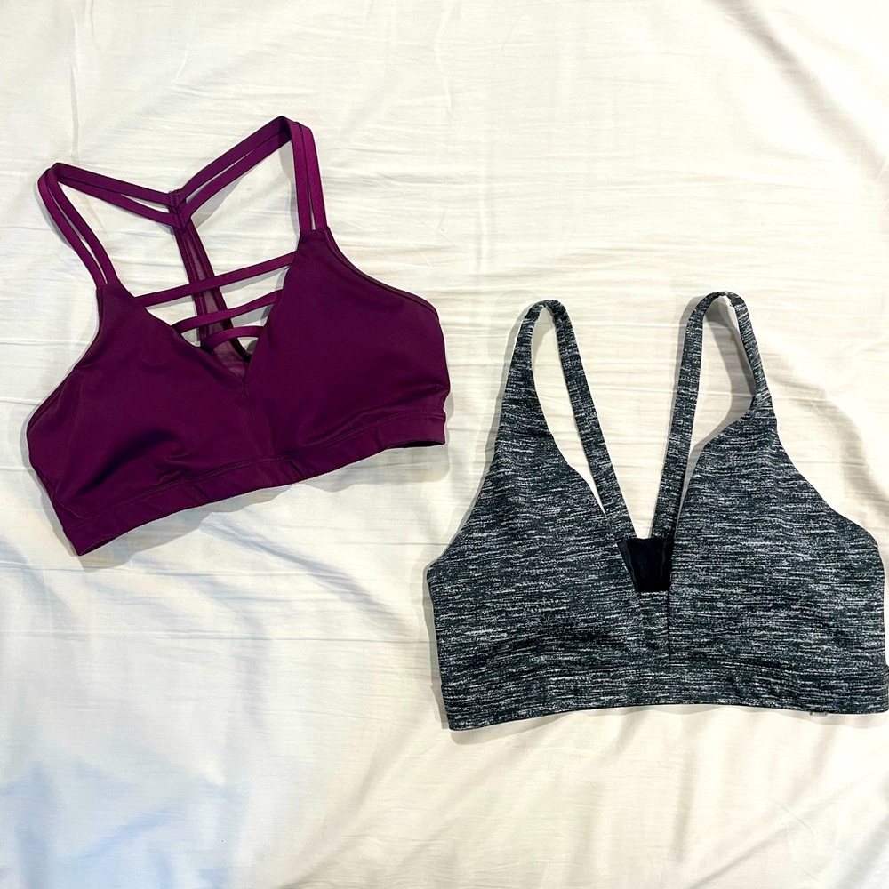 Two Victorias Secret strappy sports bras